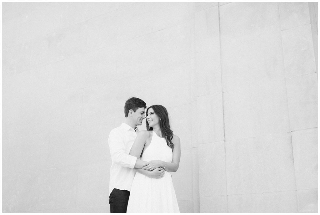 Couple walking outside of New Orleans Museum of Art wedding engagement pictures 